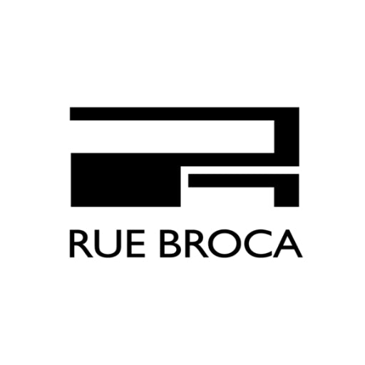 A luxurious display of RUE BROCA perfumes, featuring a variety of bottles with unique, sophisticated designs.