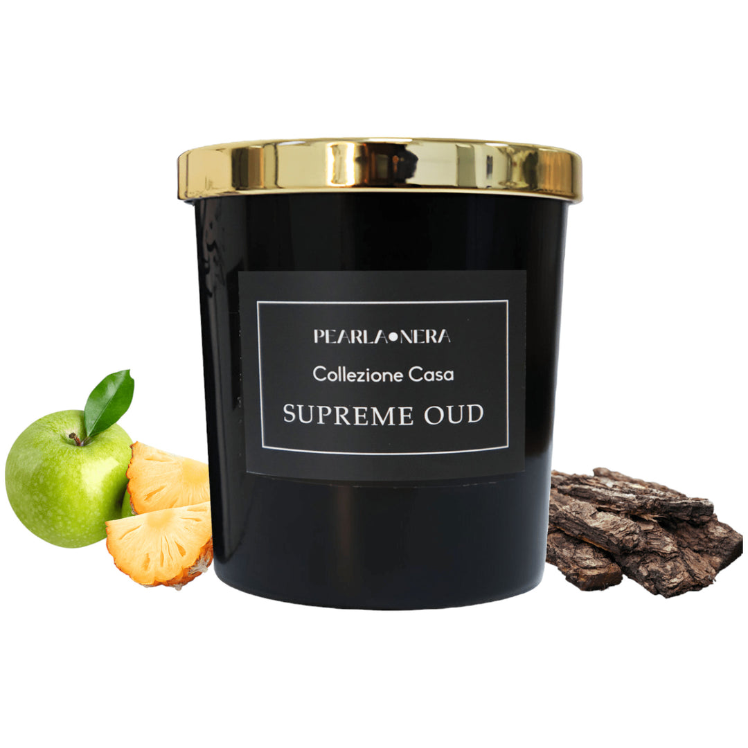 A festive Supreme Oud -scented candle with oud and green apples, perfect for the holiday season.