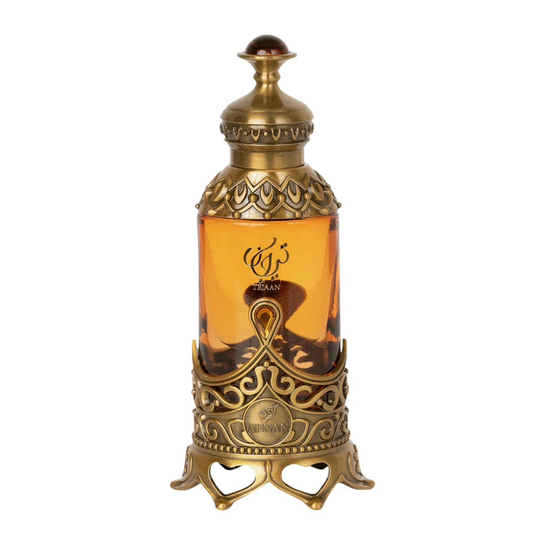 20ml Afnan Tejaan perfume oil bottle featuring captivating notes of citrus, resins, amber, and wood, crafted for prolonged wear and simplicity of application.