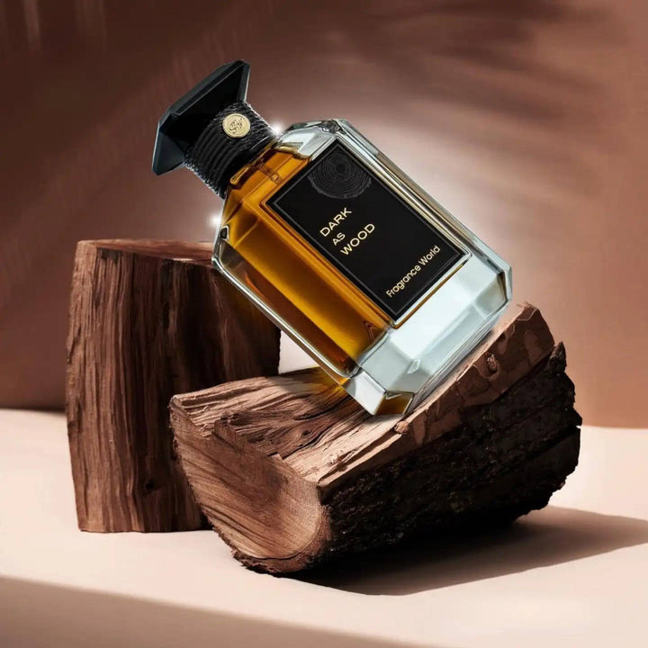 Ingredients spotlight on Dark As Wood Perfume, highlighting red berries, guaiac wood, and vanilla.