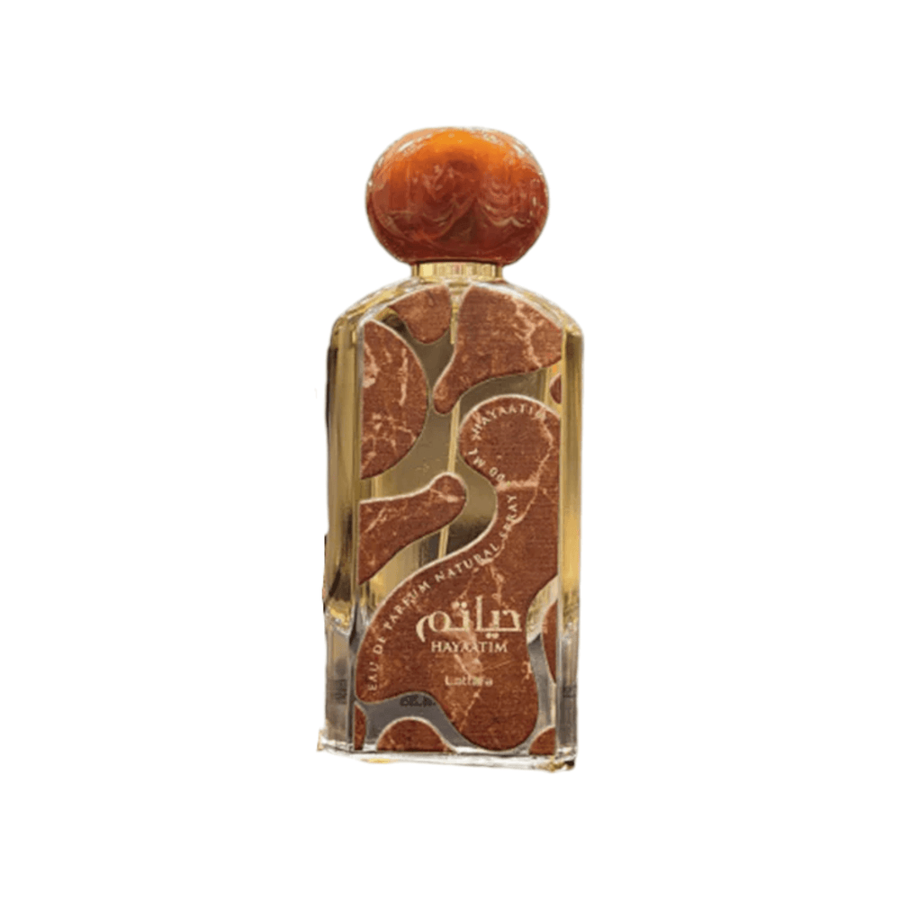 Close-up of the Lattafa Hayaatim perfume bottle, highlighting the blend of grape, pineapple, and lime top notes.