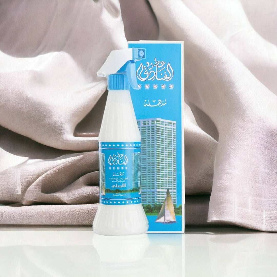 Elegant 500ml bottle of Luxury Hotel Scent Air Freshener, showcasing its clear and sleek design filled with a luxurious aromatic-woody fragrance ideal for home use.