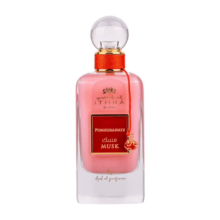 Close-up of the Pomegranate Perfume bottle, highlighting its elegant design and the fusion of musk and pomegranate notes.