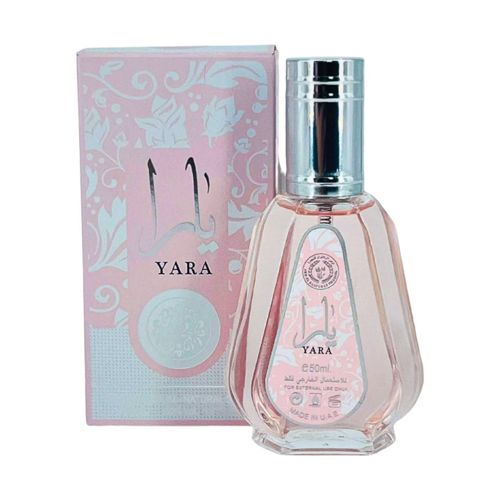 Yara 50ml Eau De Parfum by Ard Al Zaafaran, a bottle against a backdrop suggesting a tropical and floral ambiance.