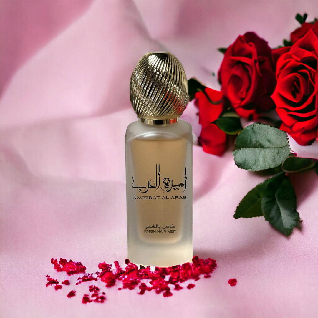 Close-up of Ameerat Al Arab Hair Mist spray, highlighting the exotic and rich fragrance notes of Wood, Musk, and Oud.